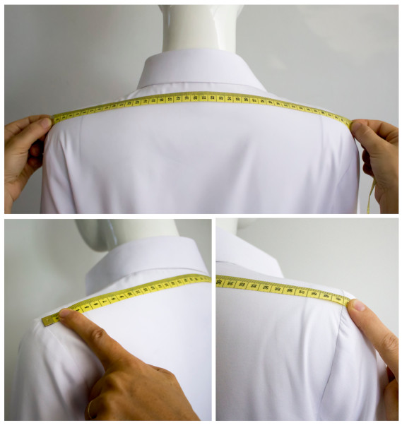 A person measuring a shirtDescription automatically generated